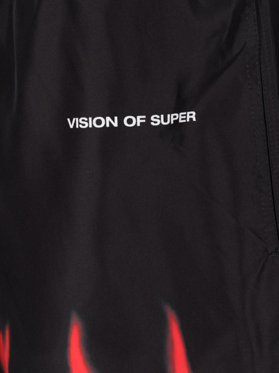 Shop Vision Of Super Flame-print Swim Shorts In Black