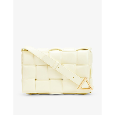 Shop Bottega Veneta Padded Cassette Leather Cross-body Bag In Zest Washed-gold