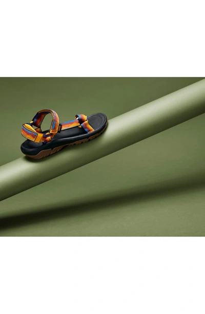 Shop Teva Hurricane Xlt 2 Sandal In Atmosphere Carrot/ Blue Mirage