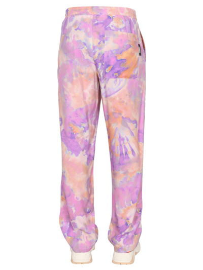 Shop Msgm Tie Dye Pattern Pants In Lilac