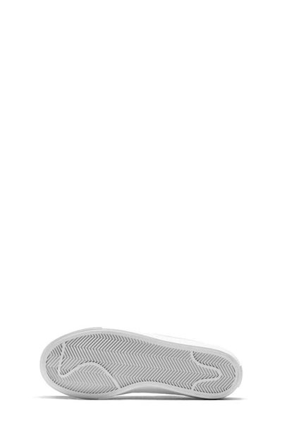 Shop Nike Kids' Court Legacy Sneaker In White/ White
