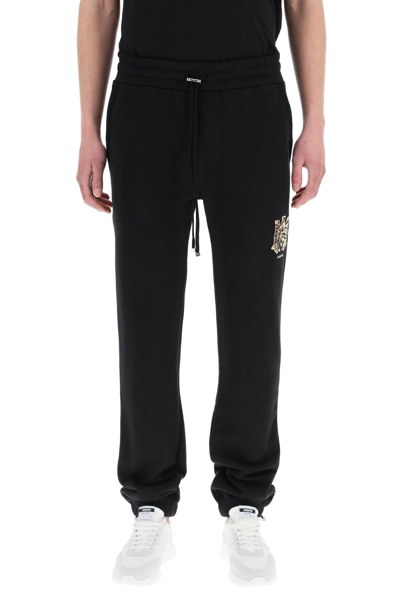 Shop Amiri Lunar New Year Sweatpants In Black