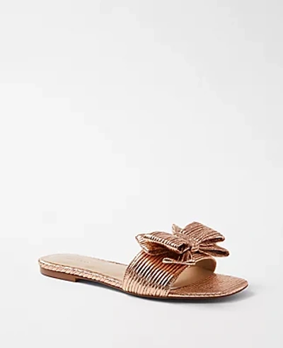 Shop Ann Taylor Metallic Bow Slide Sandals In Rose Gold