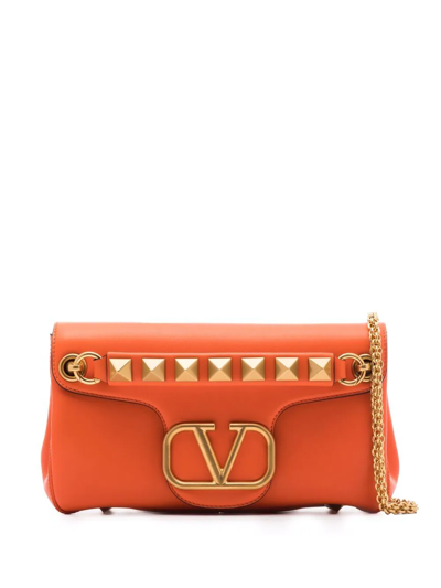Shop Valentino Stud Sign Shoulder Bag In Orange