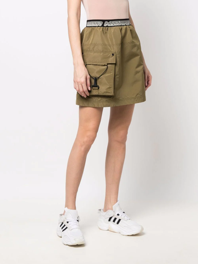 Shop Stella Mccartney Logo-waistband Cargo-pocket Skirt In Grün