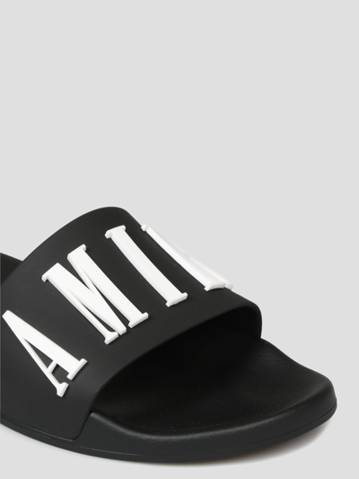 Shop Amiri Core Logo Poo Slide In Black
