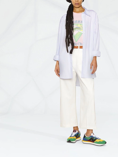 Shop Polo Ralph Lauren Cropped Flared Trousers In White