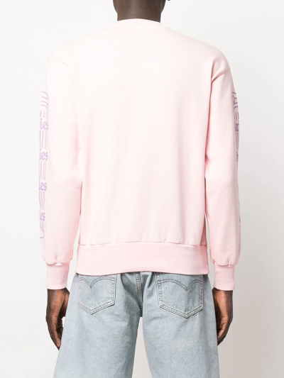 Shop Aries Logo-print Cotton Sweatshirt In Pink