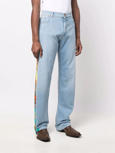 Shop Versace Royal Rebellion-print Straight-leg Jeans In Blau