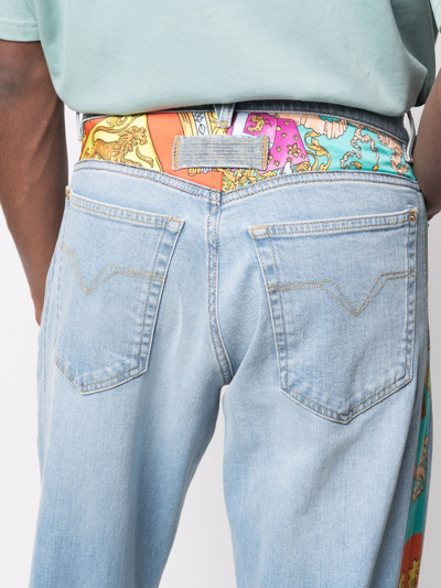 Shop Versace Royal Rebellion-print Straight-leg Jeans In Blau