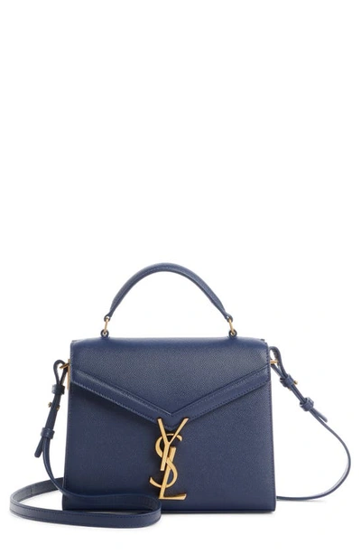 Shop Saint Laurent Mini Cassandra Leather Top Handle Bag In Blue Charron