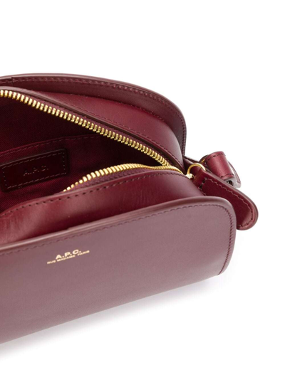 Shop Apc A.p.c. Woman's Sac Demi Lune Leather Crossbody Bag In Bordeaux