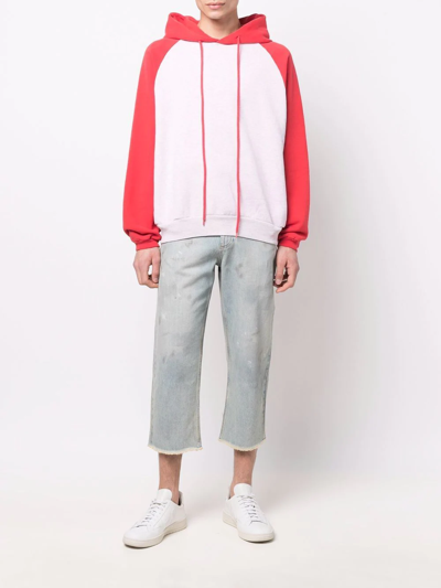 磨损边露踝牛仔裤