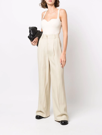 Shop Loulou Studio Pleated Straight Trousers In Schwarz