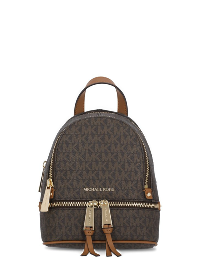 Shop Michael Michael Kors Rhea Monogram Mini Backpack In Brown