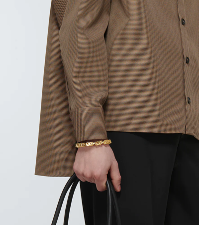 Shop Givenchy G Cube Gold Tone Bracelet In Golden Yellow