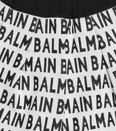 Balmain Black All Over Branded Bermuda Shorts In 110ne-beige/nero