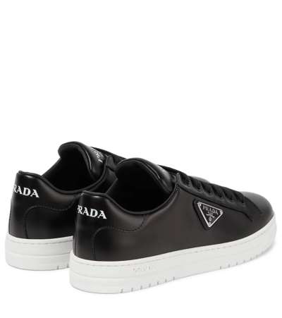 Shop Prada Downtown Logo Leather Sneakers In Nero+bianco