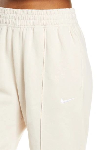 Shop Nike Sportswear Essential Fleece Pants In Pearl White/ White