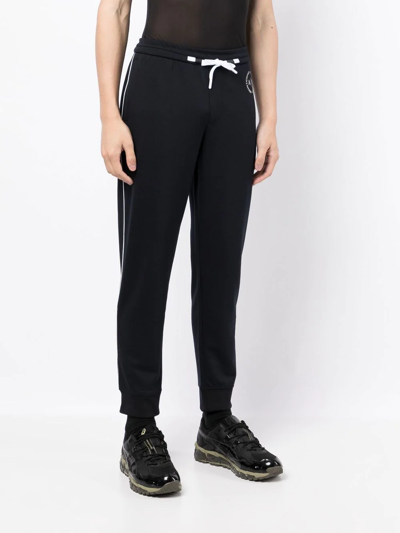 Shop Armani Exchange Slim-cut Logo Track-pants In Blue