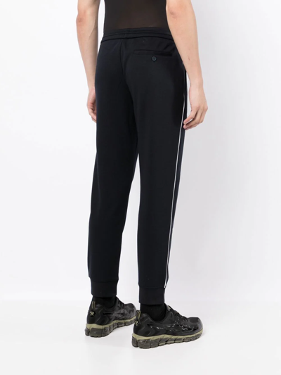 Shop Armani Exchange Slim-cut Logo Track-pants In Blue