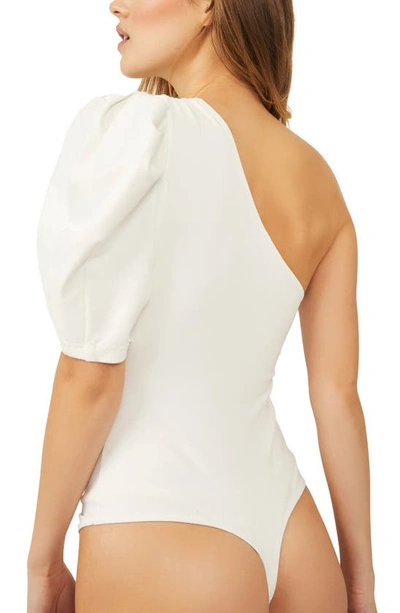 Shop Free People Somethin Bout You One-shoulder Bodysuit In Ivory