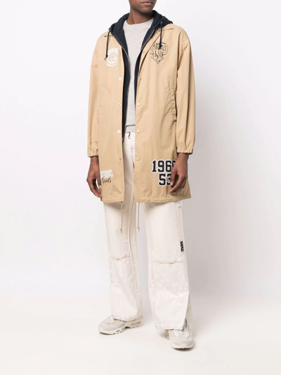 Shop Undercoverism Multiple-patch Hooded Parka In Neutrals