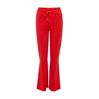 Shop Jw Anderson Slim Flare Track Pants In Red