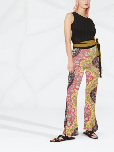 Shop Etro Paisley-print Flared Trousers In Gelb