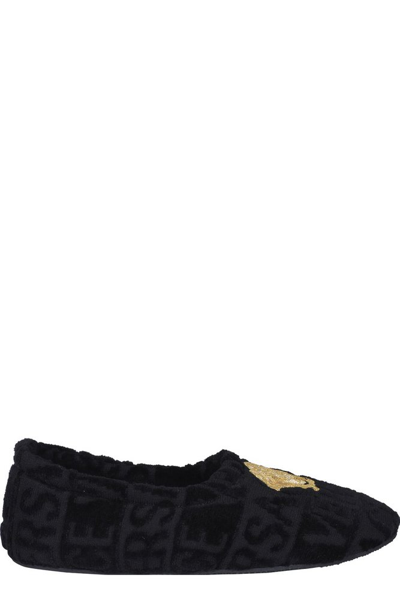 Shop Versace Logo Embroidered Round Toe Slippers In Black