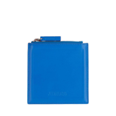 Shop Jacquemus Logo Embossed Zipped Wallet In Blue