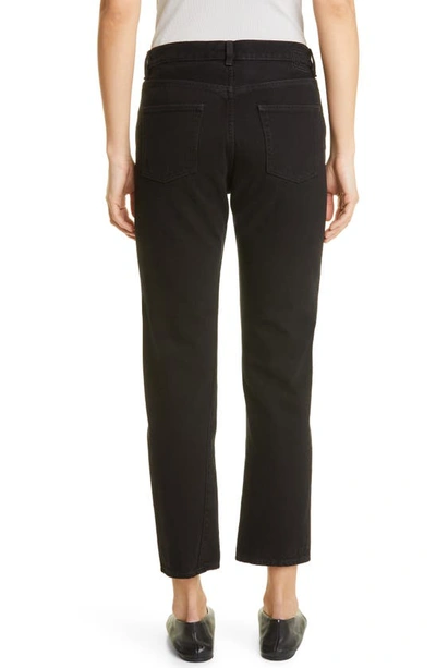 Shop Totême Twisted Seam High Waist Straight Leg Jeans In Black