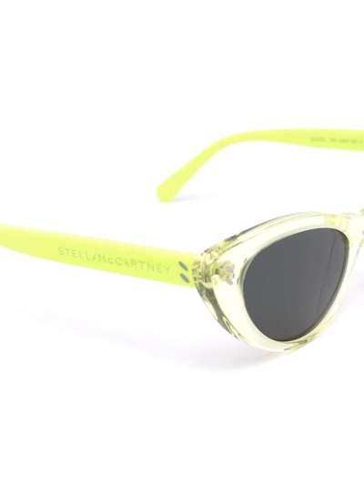 Shop Stella Mccartney Cat-eye Transparent Sunglasses In Yellow