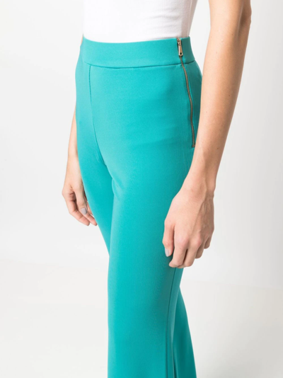 The Andamane Turquoise Gaia Flared Pants In Blue