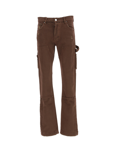 Shop Amiri Trousers In Brown-14 oz