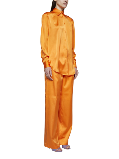 Shop Nineminutes Pants In Orange