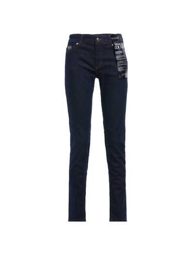 Shop Versace Jeans Couture Embroidered Washed Stretch Denim Jeans In Indigo