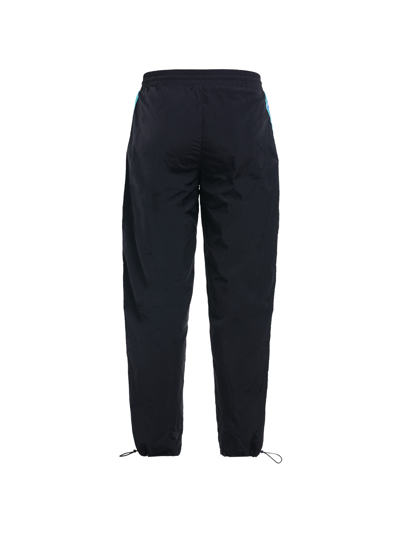Shop Versace Jeans Couture Trousers With Logo Ribbon On Sides In Black