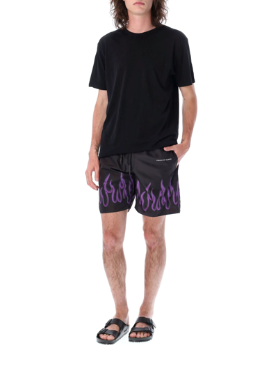Shop Vision Of Super Pulple Flame Spray Print Swim Shorts In Black