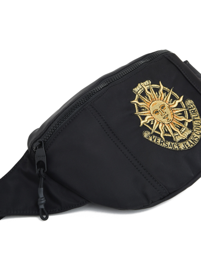 Shop Versace Jeans Couture Sling Bag With Embroidered Logo Detail In Nero