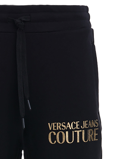 Shop Versace Jeans Couture Thick Lamina Logo Print Joggers In 899 + 948