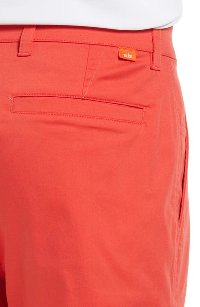 Shop Nike Dri-fit Uv Flat Front Chino Golf Shorts In Track Red