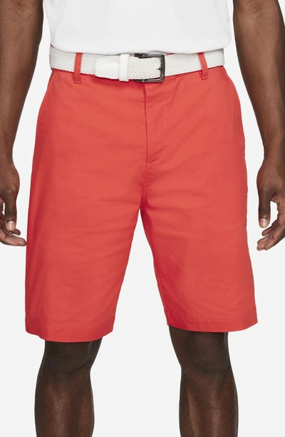 Shop Nike Dri-fit Uv Flat Front Chino Golf Shorts In Track Red