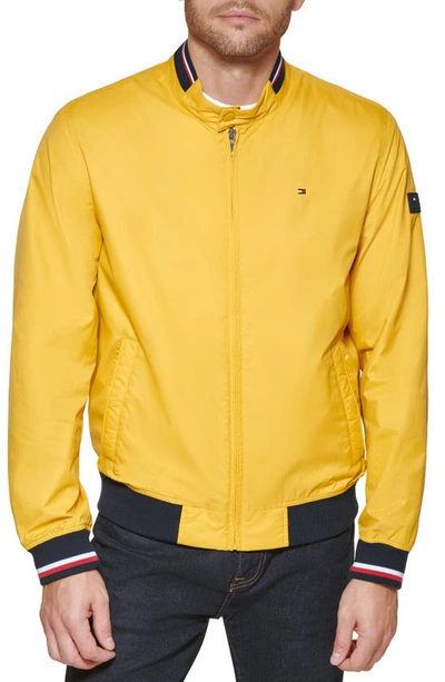 Shop Tommy Hilfiger Lightweight Bomber Jacket In Yellow