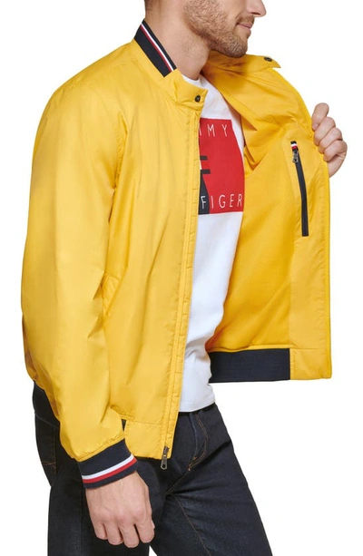 Shop Tommy Hilfiger Lightweight Bomber Jacket In Yellow