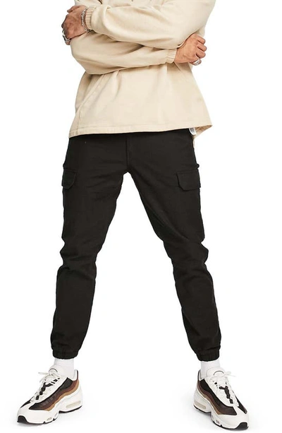 Shop Topman Stretch Cotton Skinny Cargo Joggers In Black