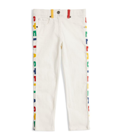 Shop Stella Mccartney Kids Rainbow Logo Jeans (3-16 Years) In Multi