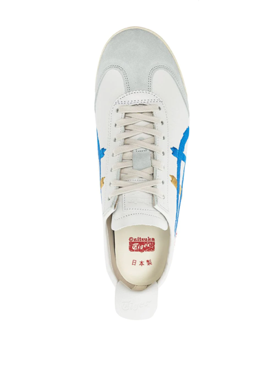 Shop Onitsuka Tiger Mexico 66™ Deluxe Low-top Sneakers In White