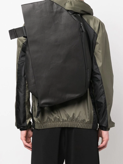 Côte And Ciel Zip-up Asymmetric Backpack In Schwarz