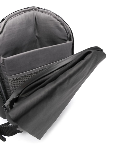 Côte And Ciel Zip-up Asymmetric Backpack In Schwarz